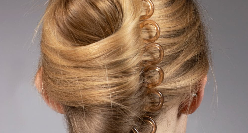 French twist held with TEGEN small chignon pins