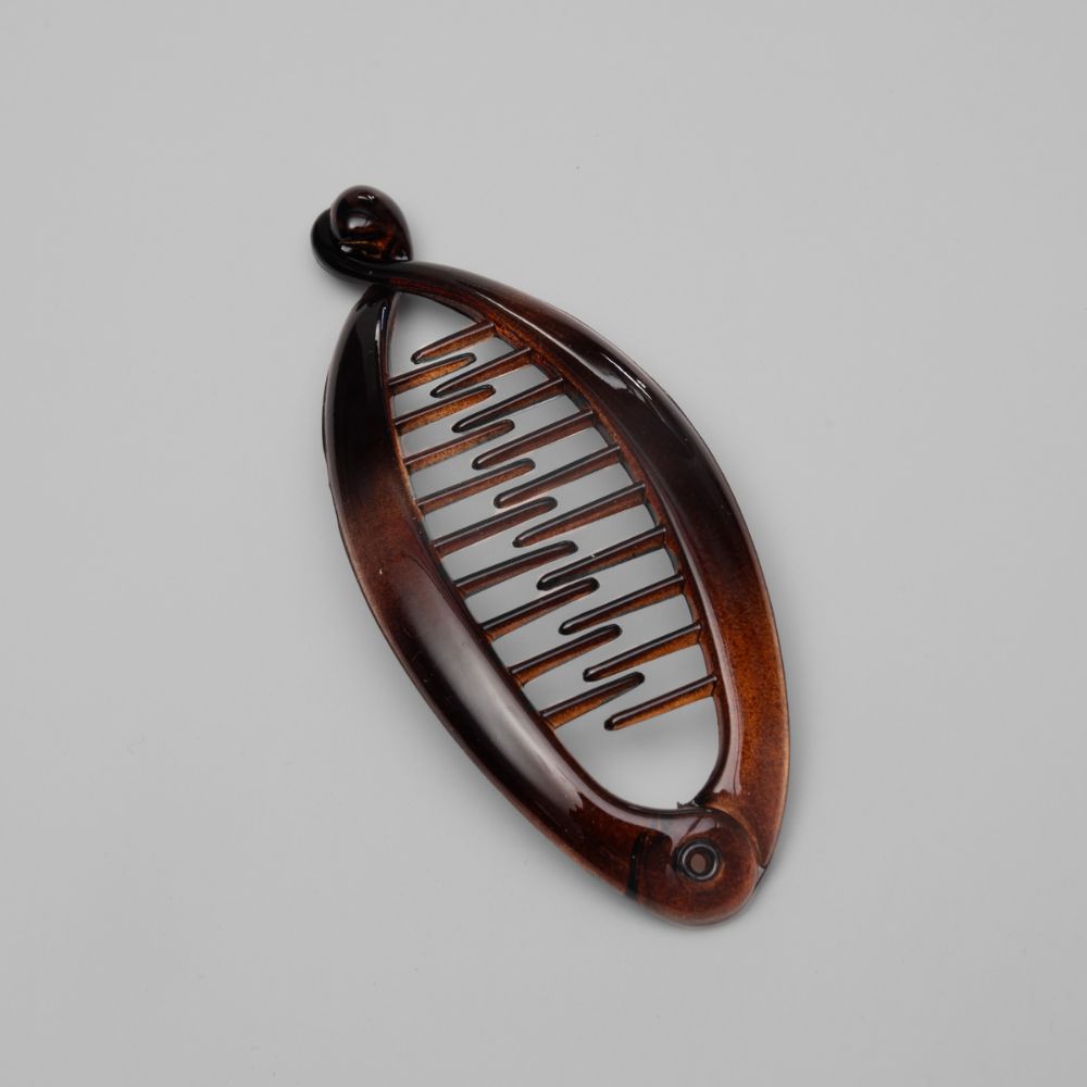 mini banana hair clip in tortoiseshell at Tegen Accessories