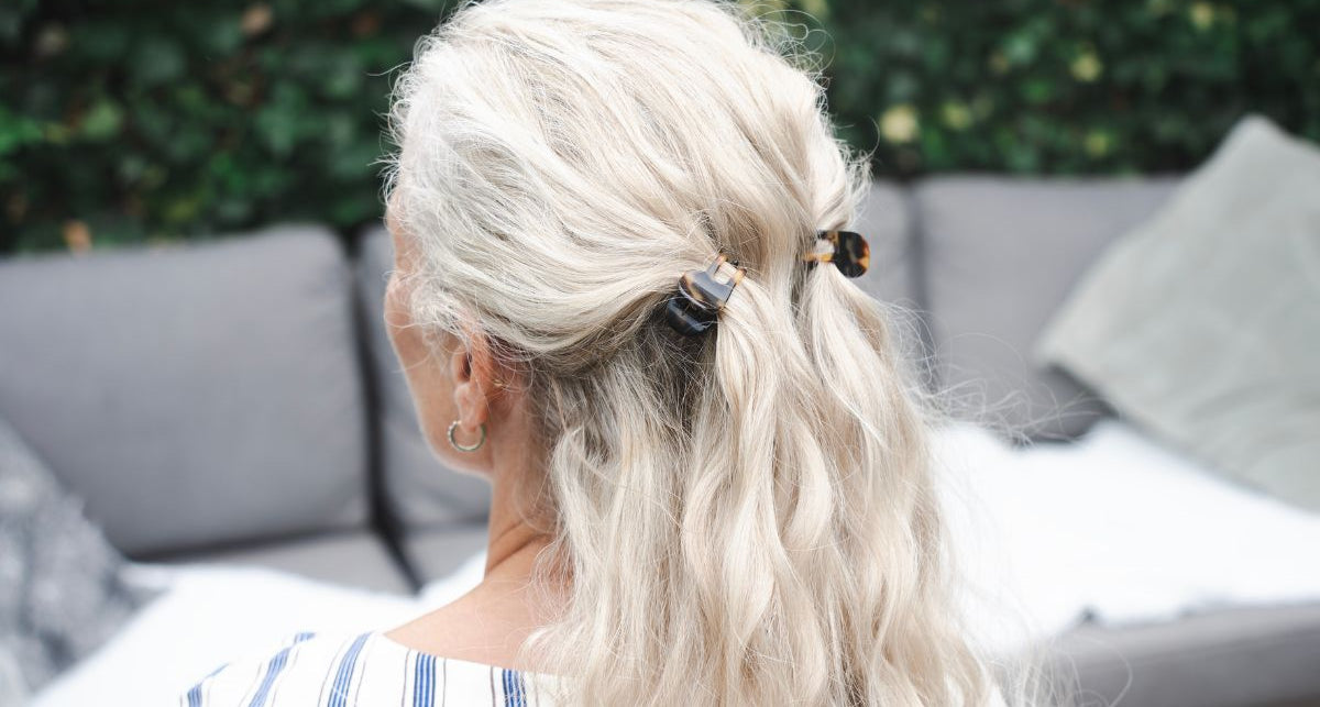 Boho half-up style in long grey hair with tiny TEGEN claw clips
