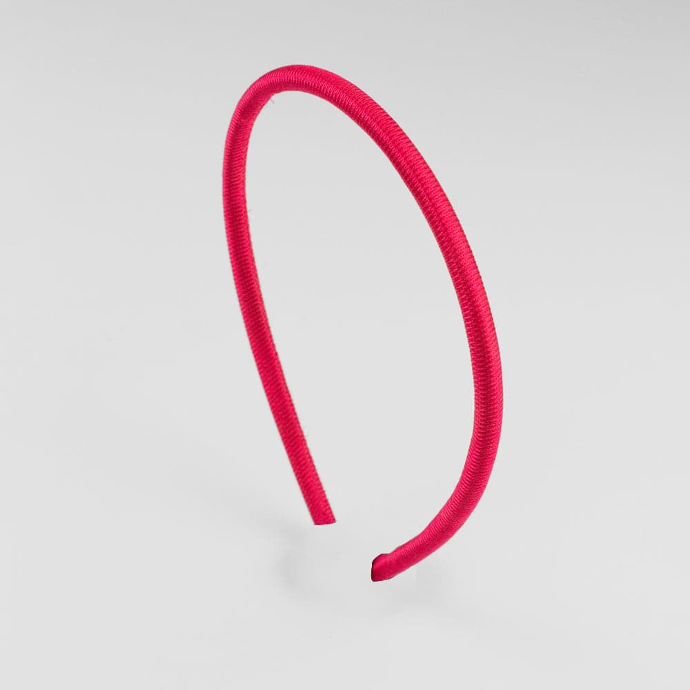 Narrow Fabric Headband at Tegen Accessories in Magenta